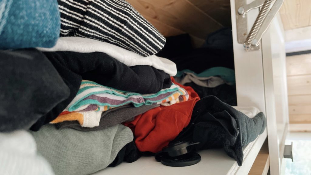 DIY camper closet full with clothes
