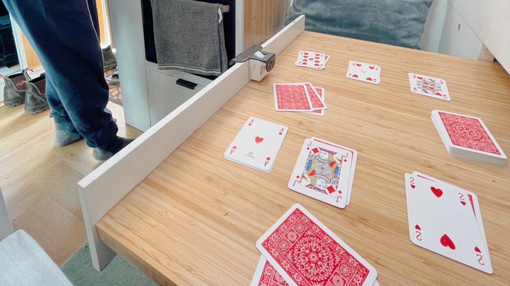 Playing cards in the camper with bad weather